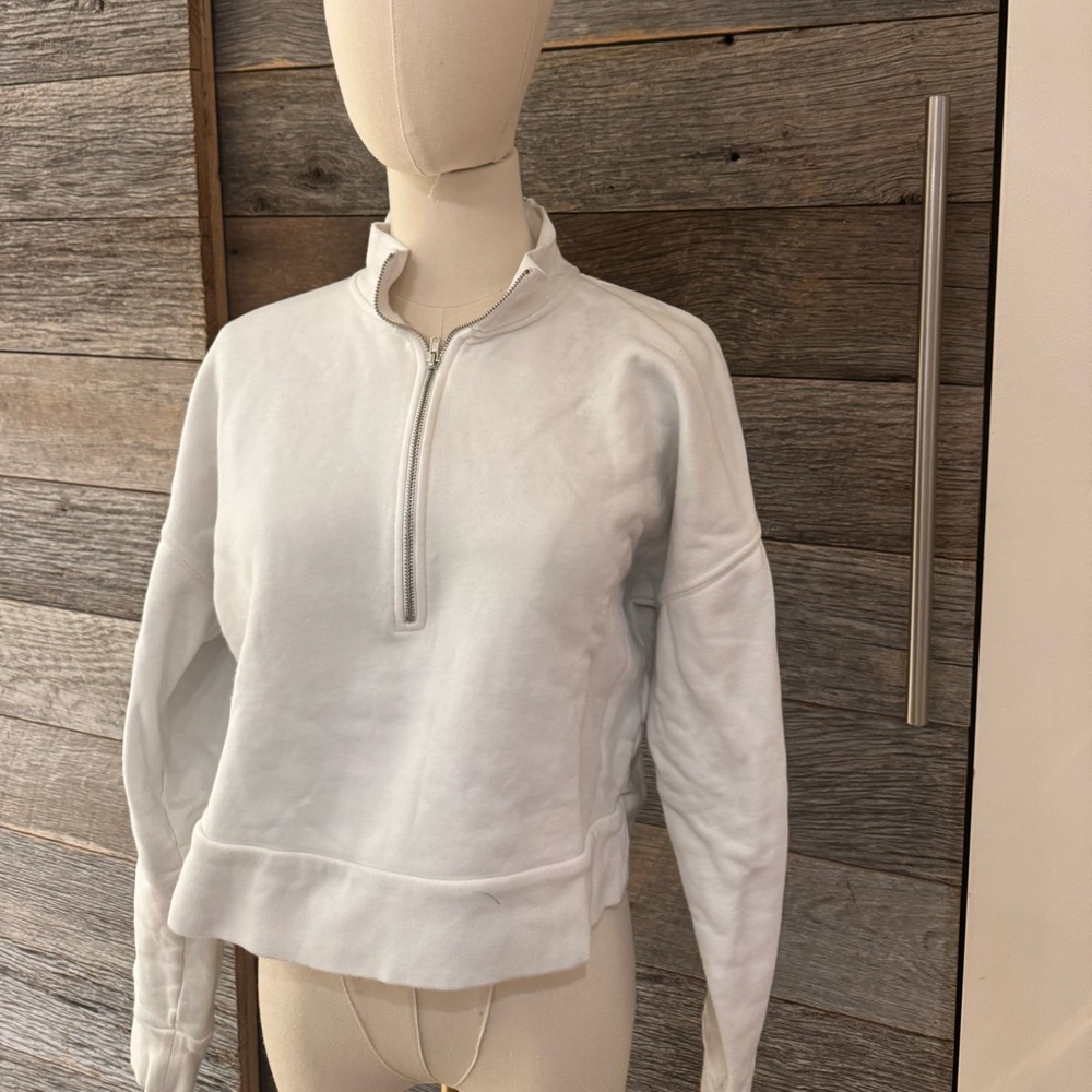 Reformation 
Size: XS
White cropped quarter zip